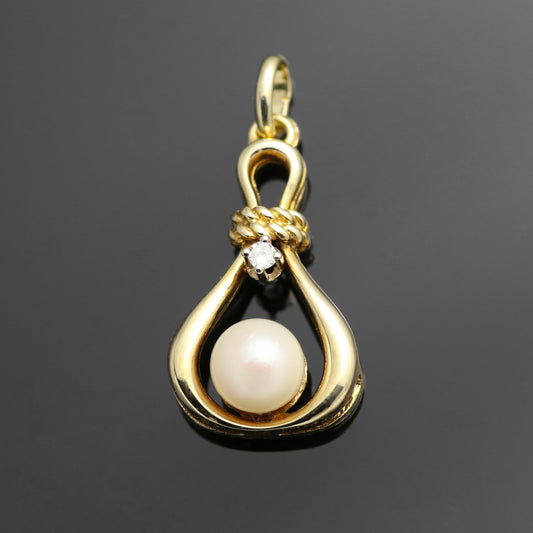 14k yellow gold pendant 1x diamond 1x freshwater cultured pearl 