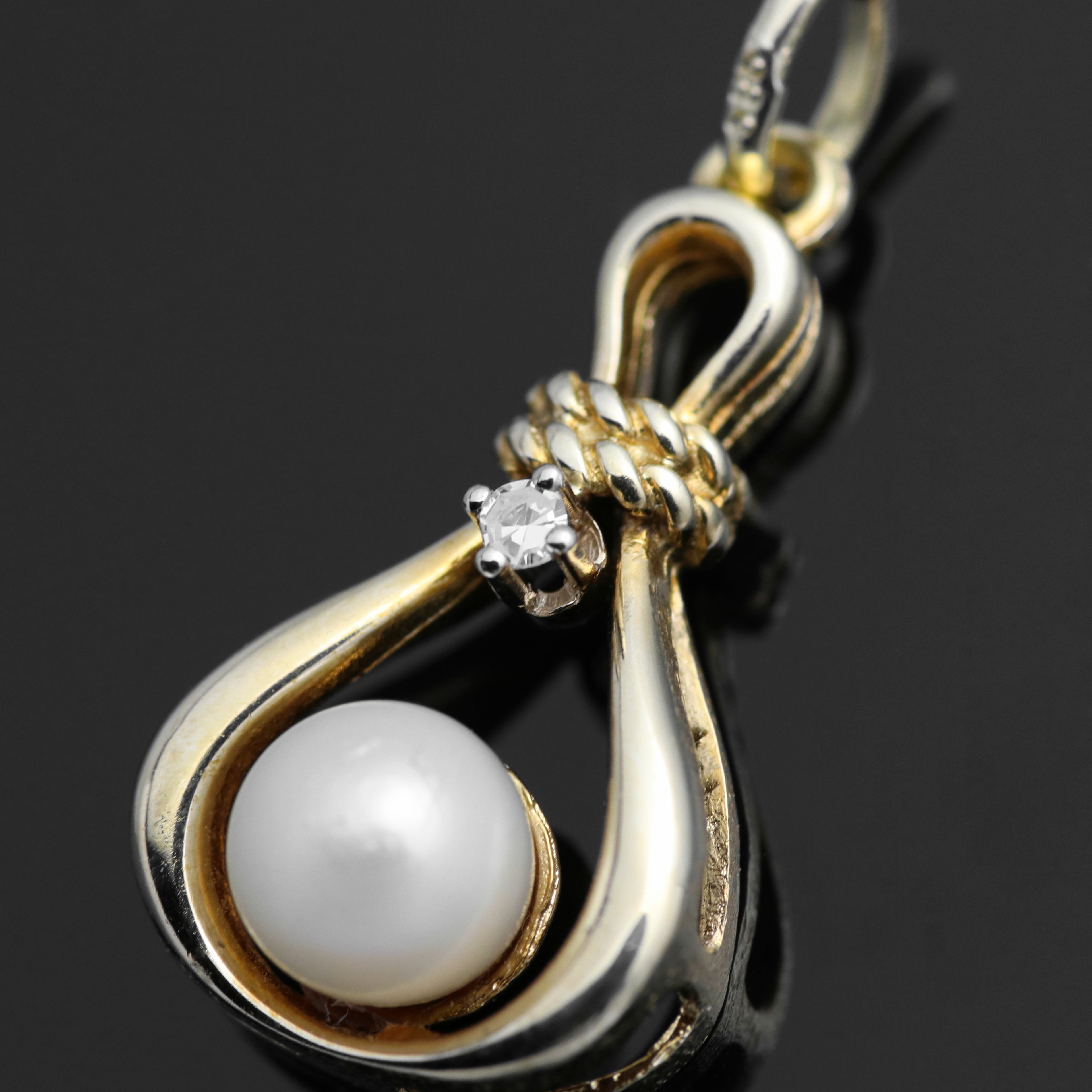14k yellow gold pendant 1x diamond 1x freshwater cultured pearl 