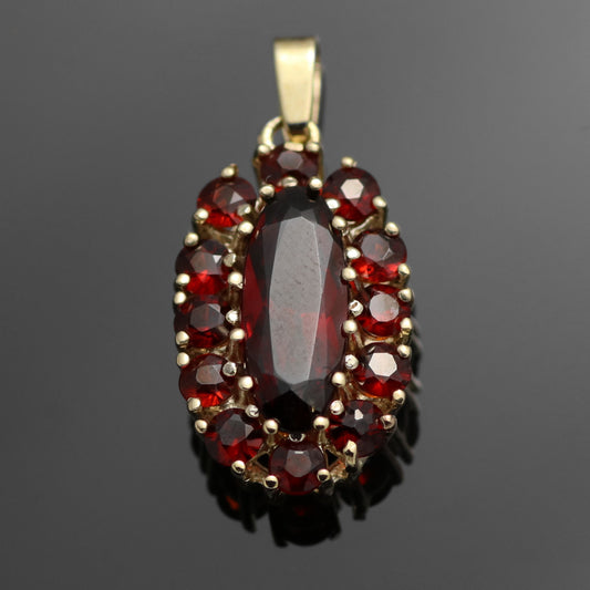 8k yellow gold pendant 13x garnet 